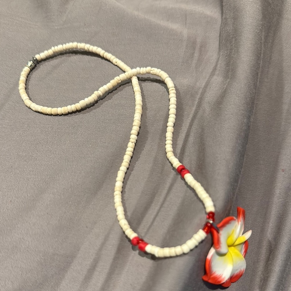 Hawaiis famous clam shell Elegant Floral Necklace with Red and Yellow Accents - Picture 5 of 7
